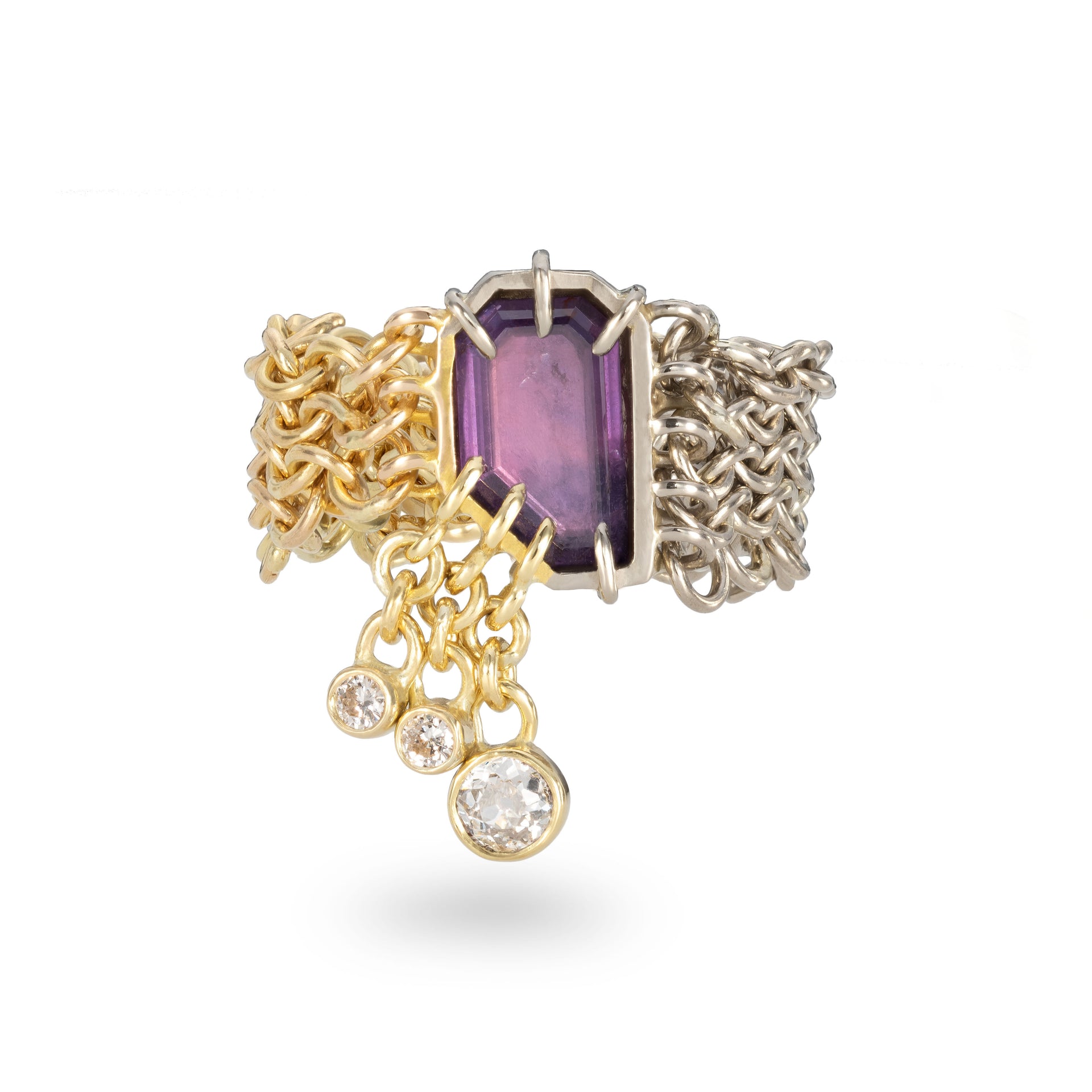 A one-of-a-kind 18ct white, yellow and rose gold chainmail ring with a central pink/purple natural sapphire and three antique diamonds set in a gold dangling chain design.