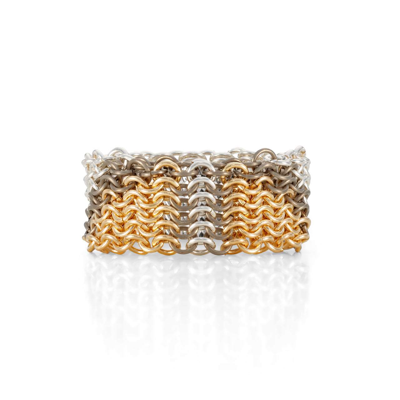 A two-tone chainmail ring featuring silver and gold colors, handcrafted from recycled materials.