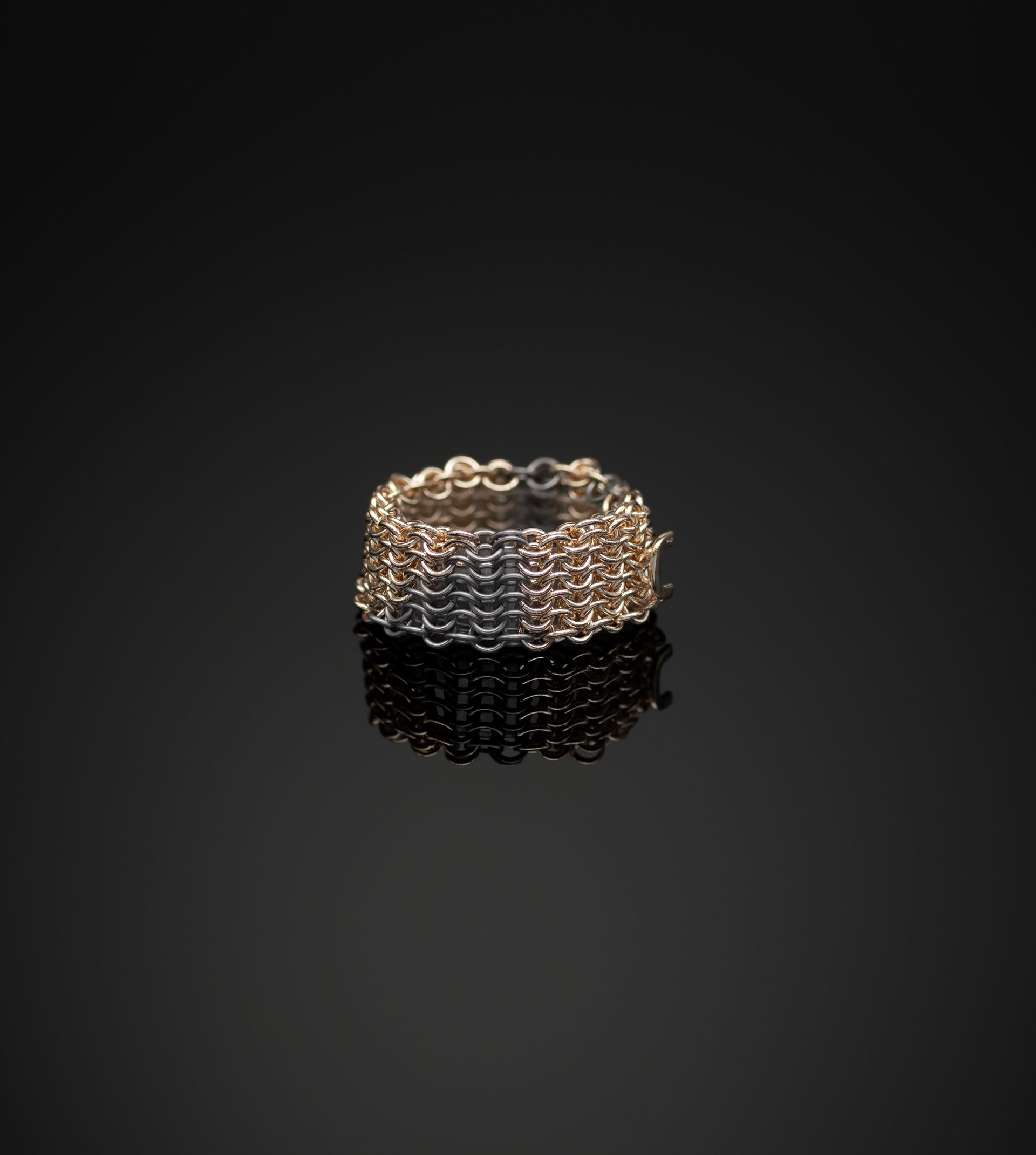 'U' recycled 18ct yellow gold and titanium ring handcrafted contemporary chainmail jewellery chain ring by Corrinne Eira Evans