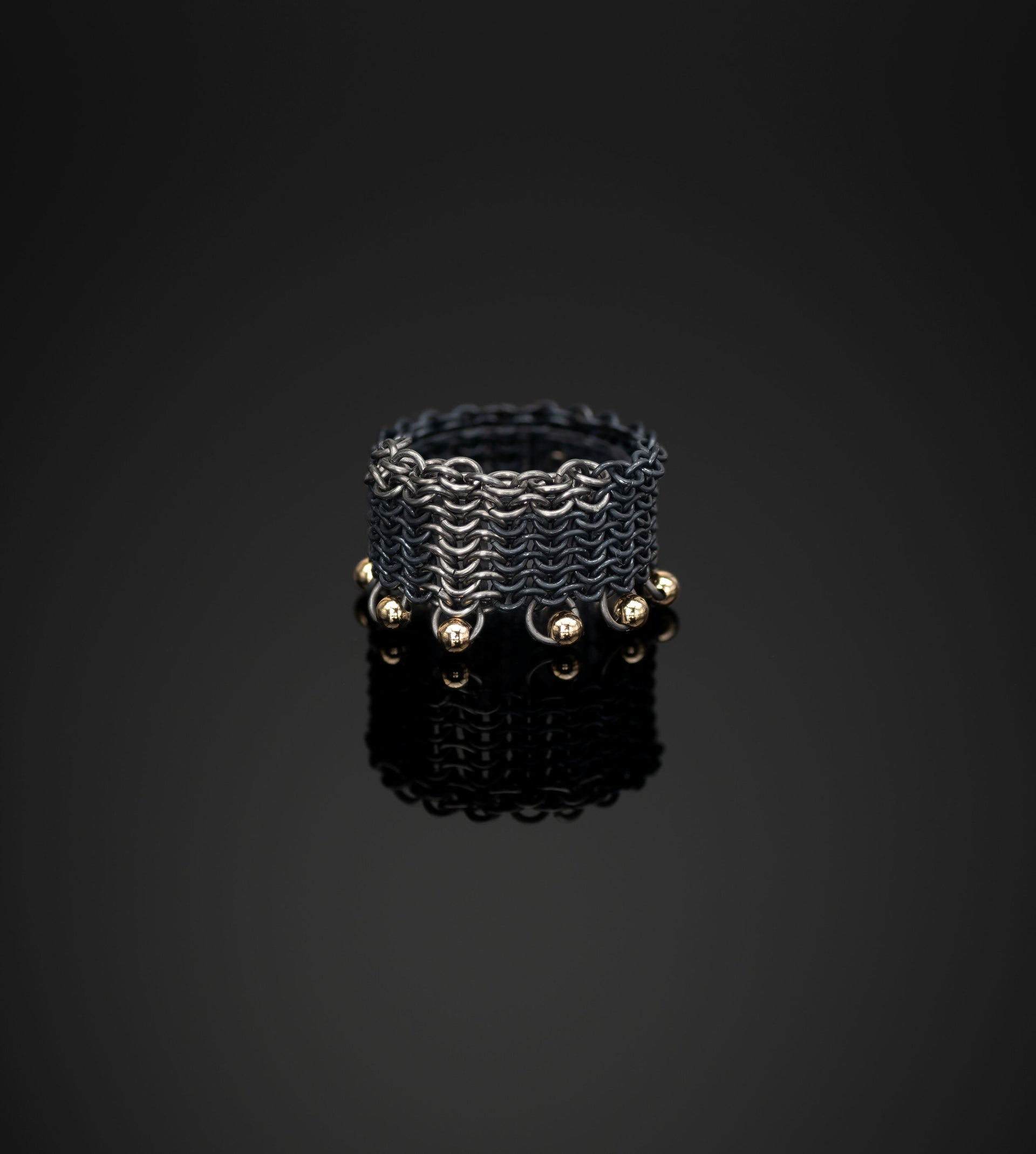 ThunderBolt || ring handmade contemporary chainmail ring handcrafted titanium, recycled oxidised silver and 18ct yellow gold chains by Corrinne Eira Evans