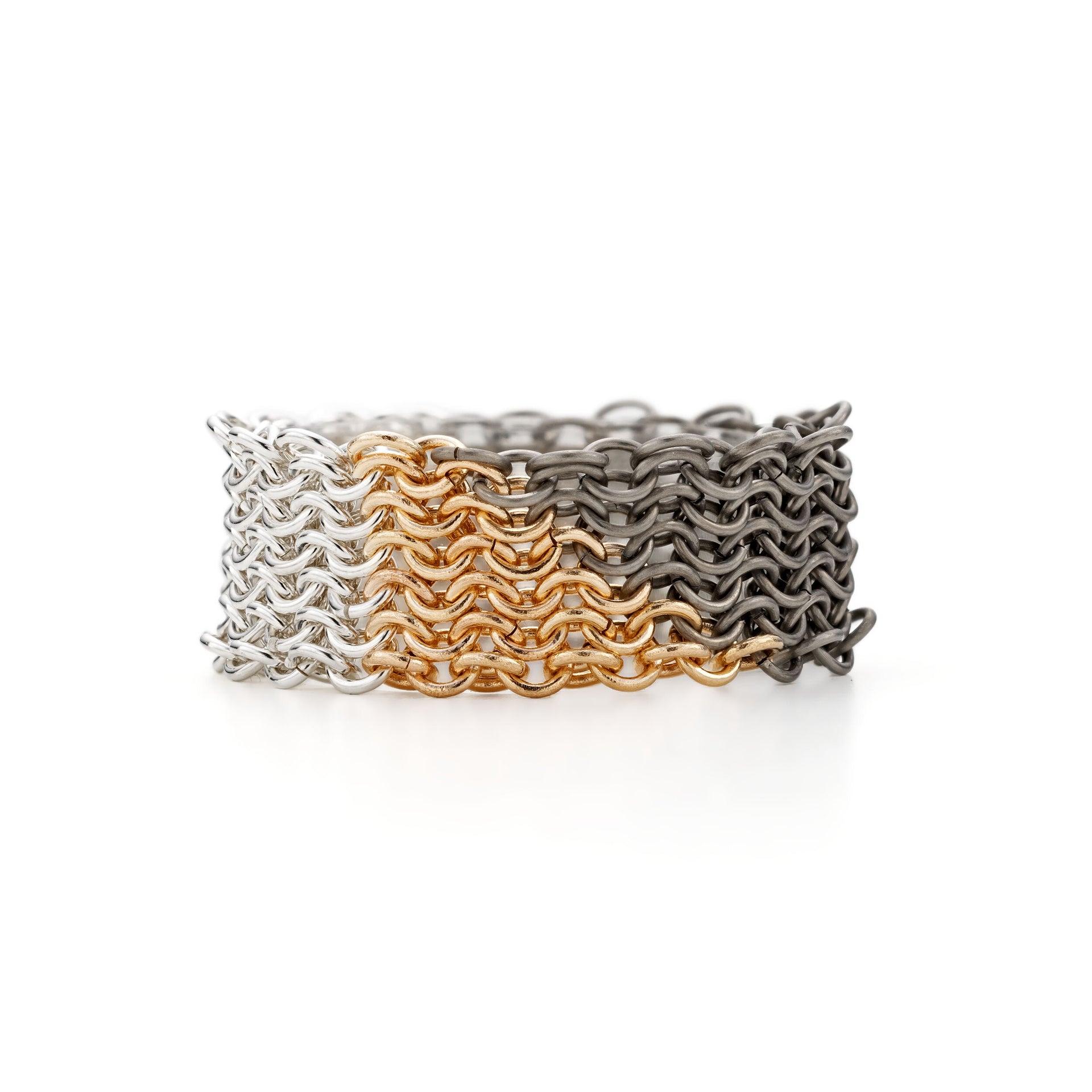 SunDial Chainmail ring contemporary chain jewellery titanium, recycled silver and 18ct yellow gold handmade by Corrinne Eira Evans. As featured in British Vogue 2022