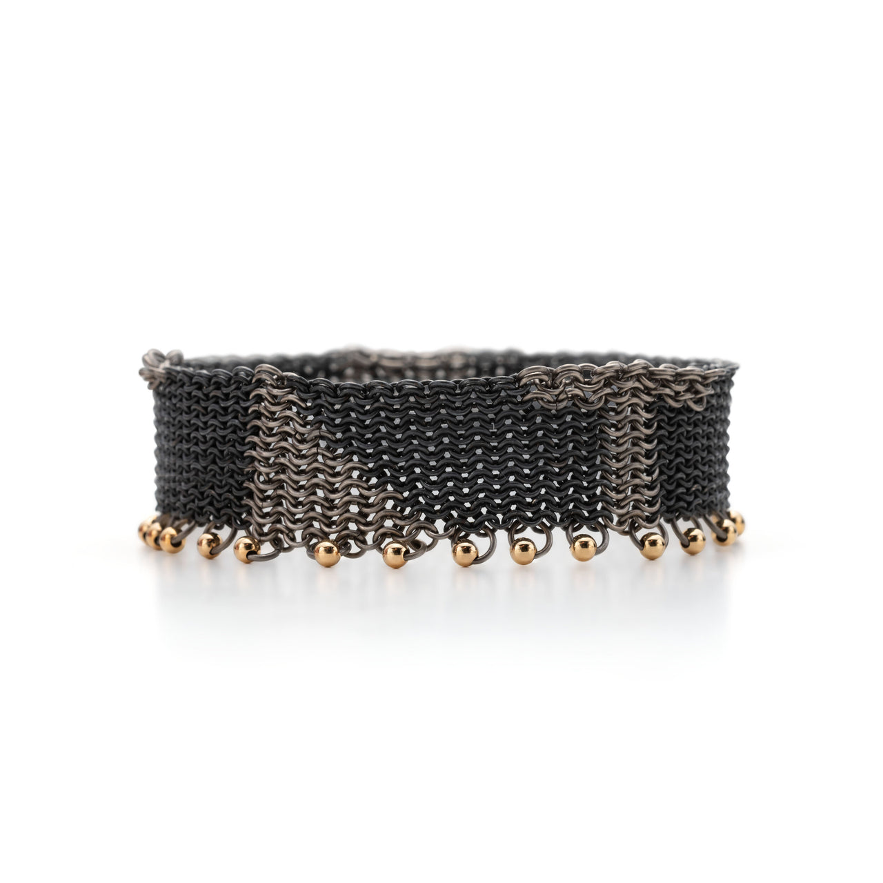 ThunderBolt || bracelet handmade contemporary chainmail bracelet bangle handcrafted titanium, recycled oxidised silver and 18ct yellow gold chains by Corrinne Eira Evans