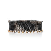 ThunderBolt || bracelet handmade contemporary chainmail bracelet bangle handcrafted titanium, recycled oxidised silver and 18ct yellow gold chains by Corrinne Eira Evans