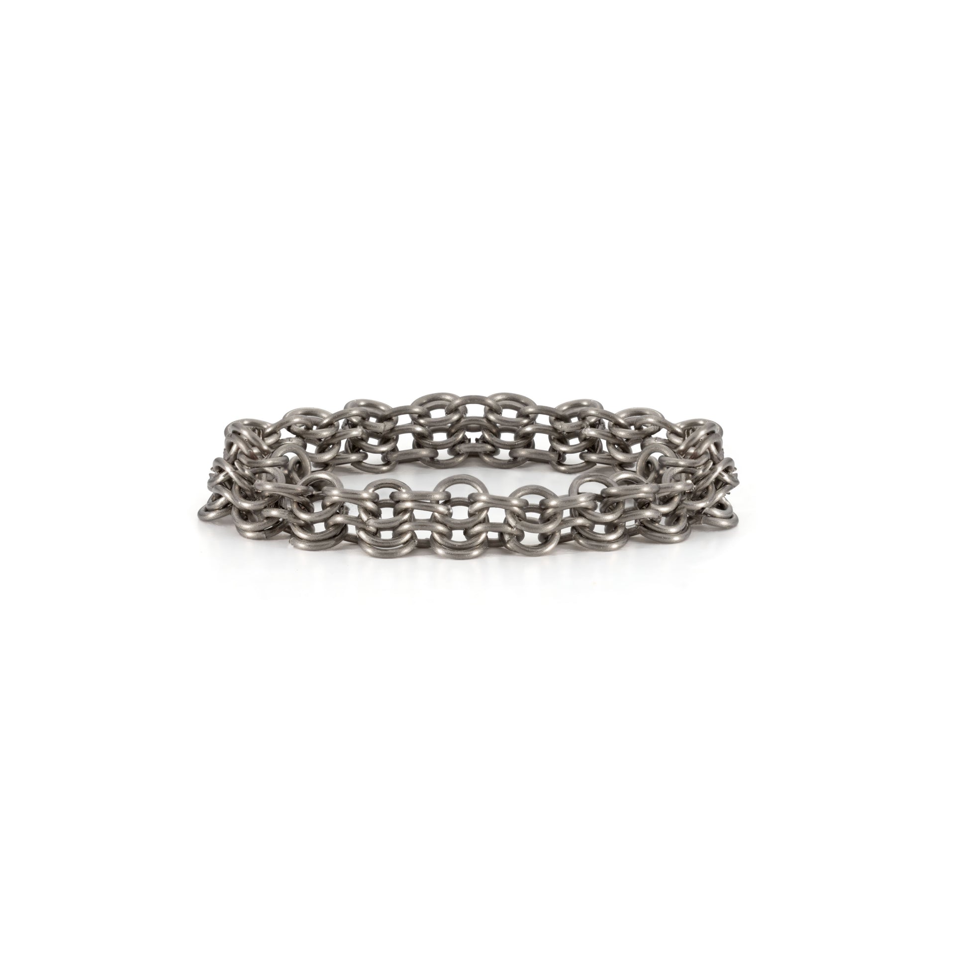 Storm chainmail ring handmade from titanium. Handcrafted contemporary jewellery by Corrinne Eira Evans
